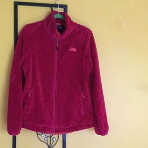 Zipped front sweater. Two pockets with zipper.